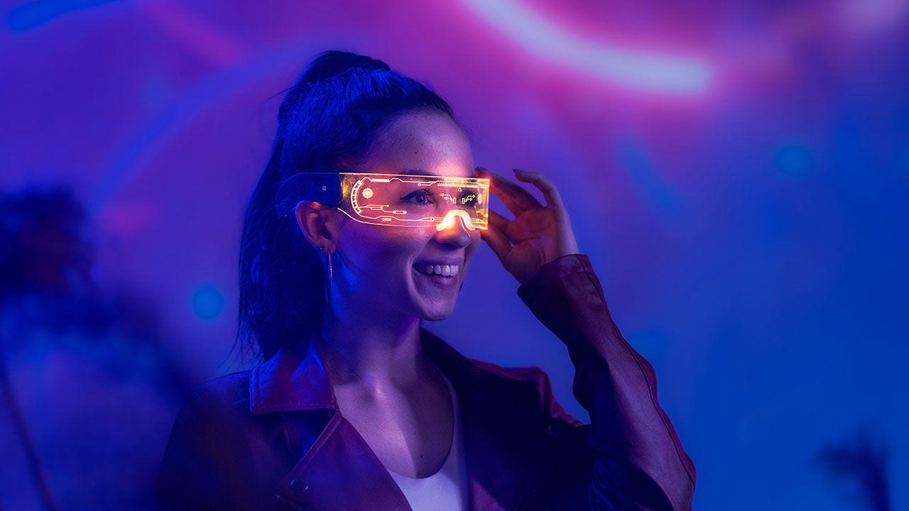 Young woman with AI glasses Young woman with AI glasses, metaverse