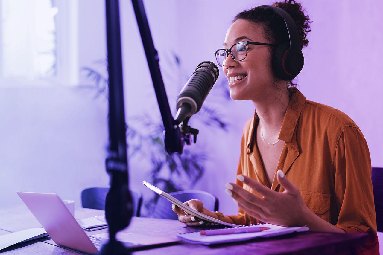 woman recording podcast woman-recording-podcast