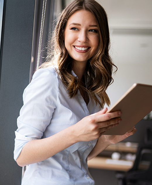 Lady with a tablet smiling