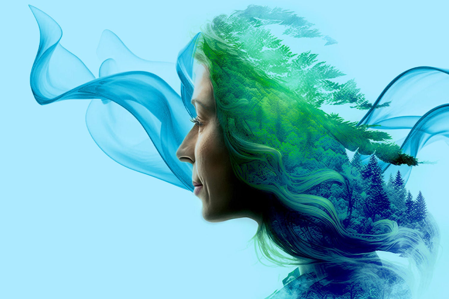 Lady with hair blowing and trees in background