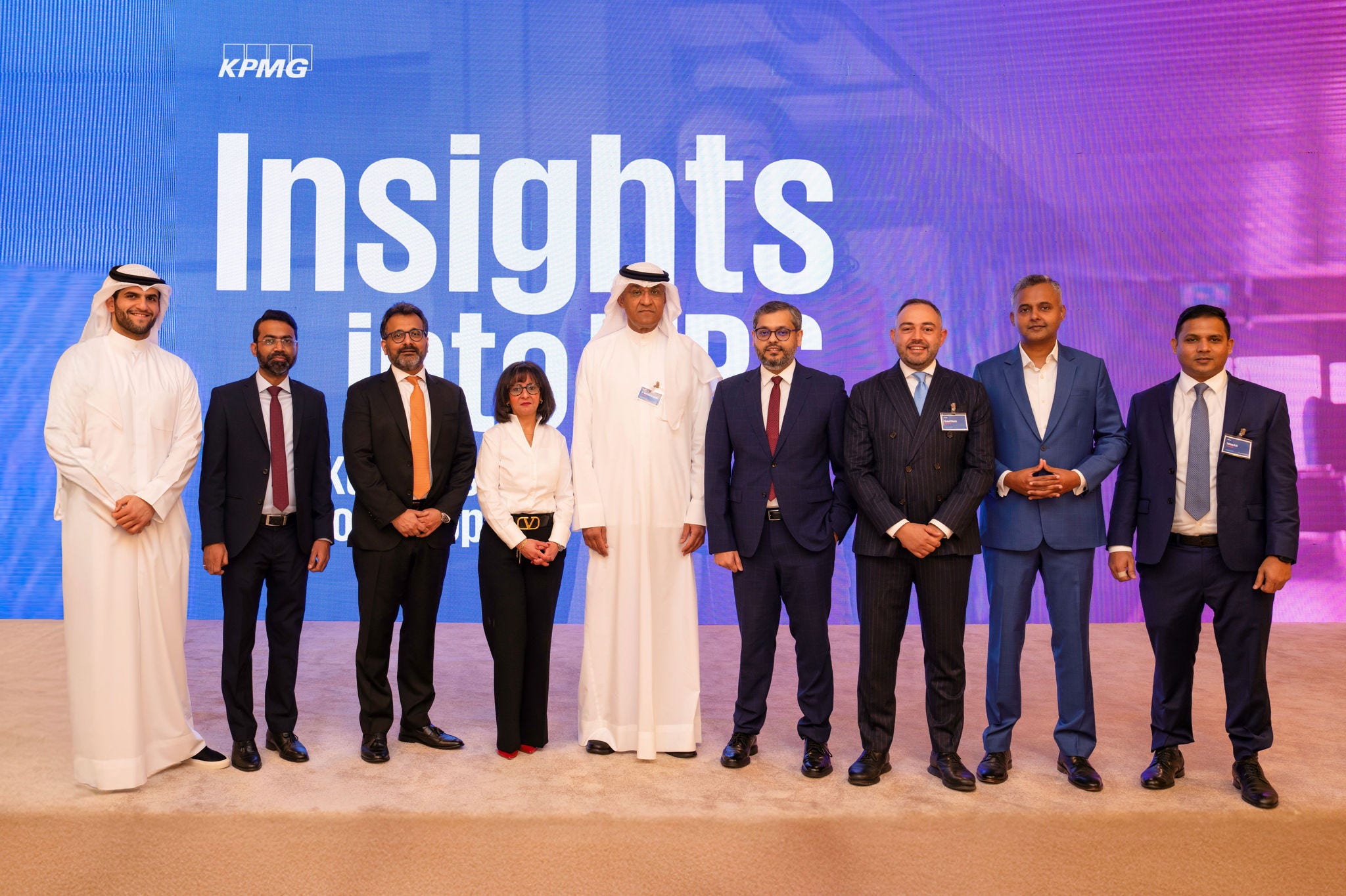 Group photo of KPMG Audit Team with Managing Partner Dr. Rasheed AlQenae