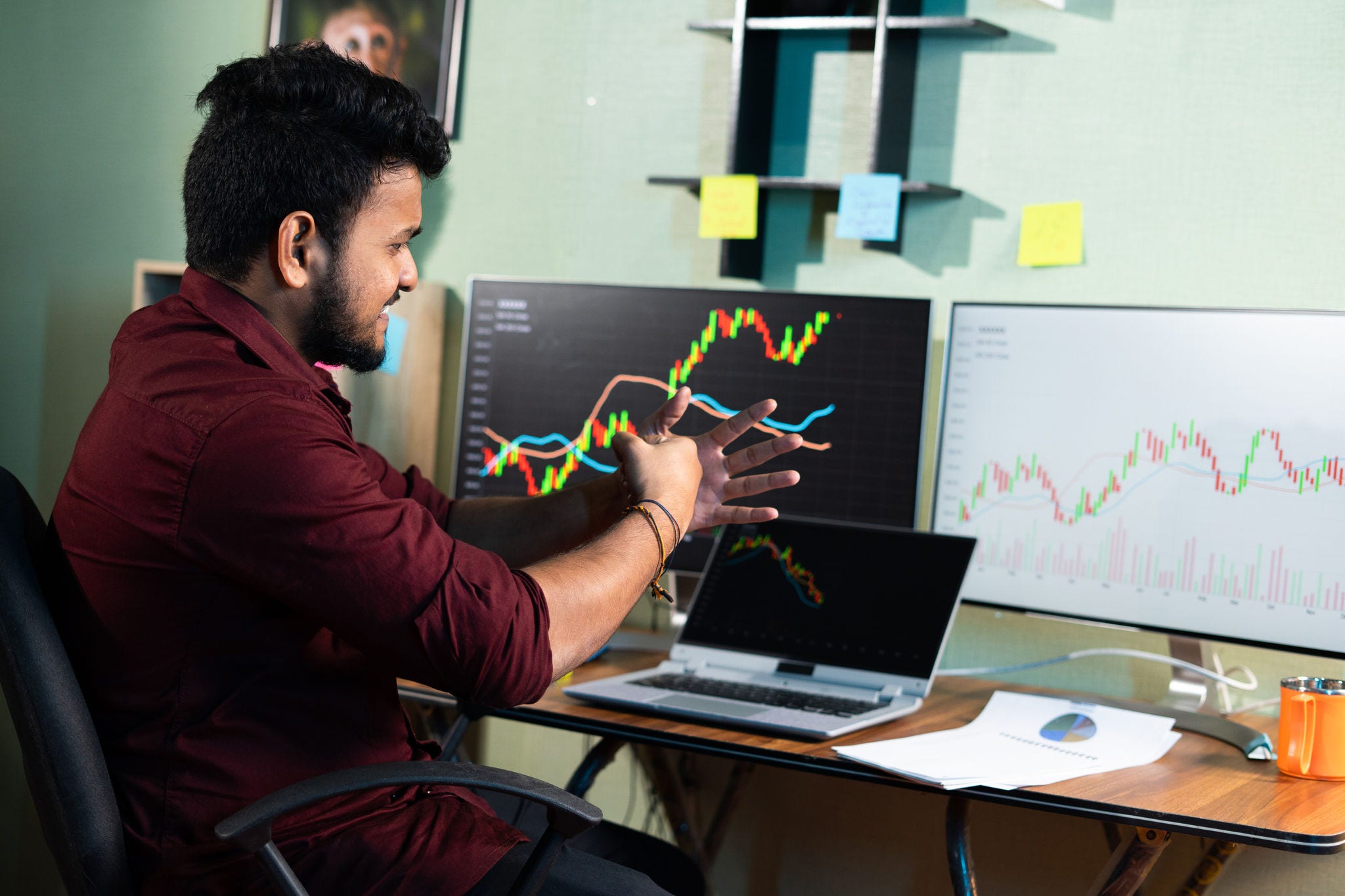 Intraday trader angry over loss in stock market investment while trading - concept showing risk of investing in cryptocurrency and millennial people losing in equities. Intraday trader angry over loss in stock market investment while trading - concept showing risk of investing in cryptocurrency and millennial people losing in equities