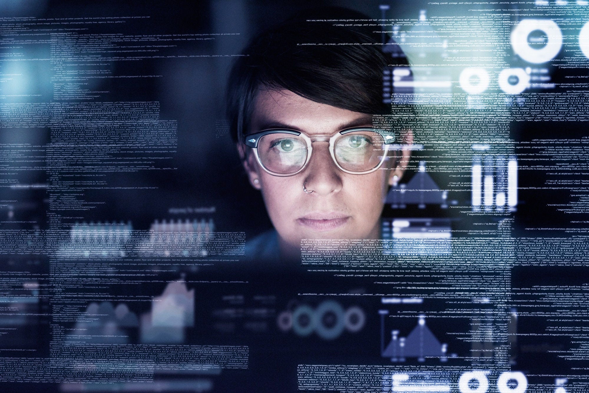 Woman wearing specs while working