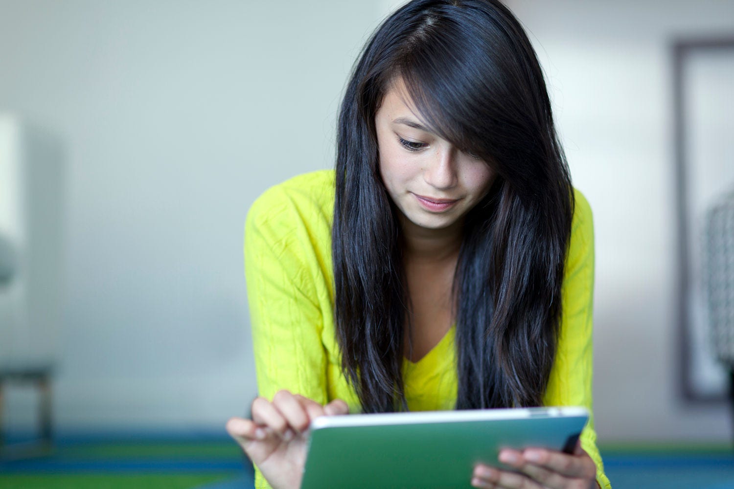 Asian girl using digital tablet