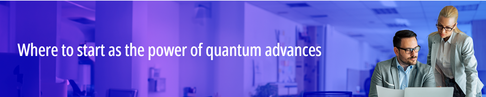 Colleagues looking at computer