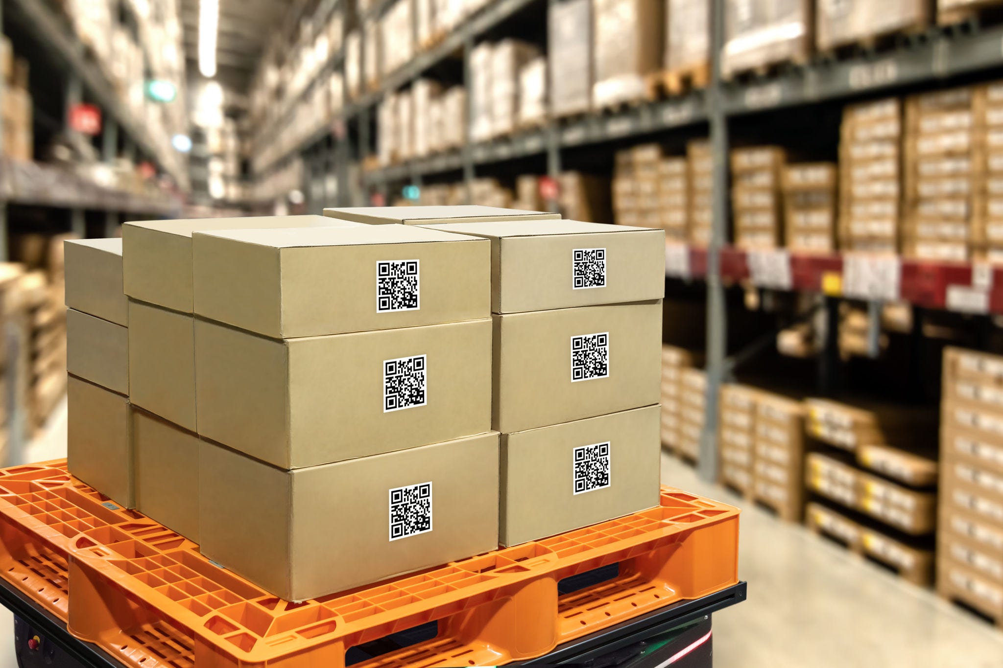 Smart logistic industry 4.0 , QR Codes Asset warehouse and inventory management supply chain technology concept. Group of boxes in storehouse can check product inside and order pick time. supply-chain-excellence-why-kpmg-in-india