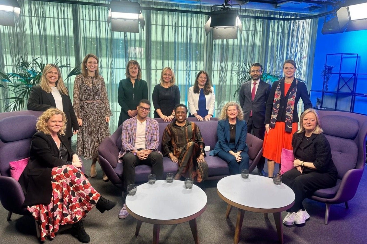 FTSE woman leaders stood in an office meeting space