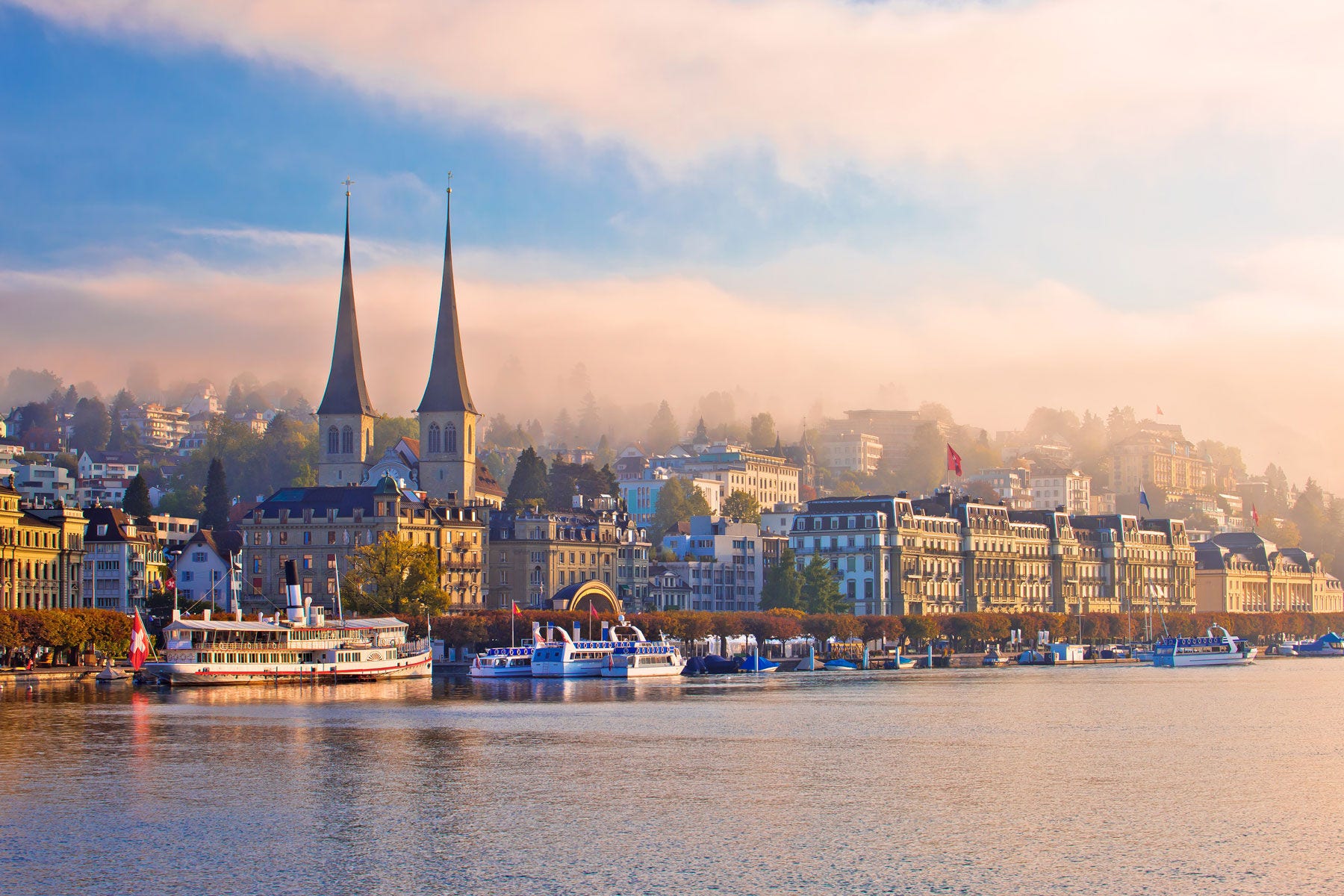 city buildings at lake