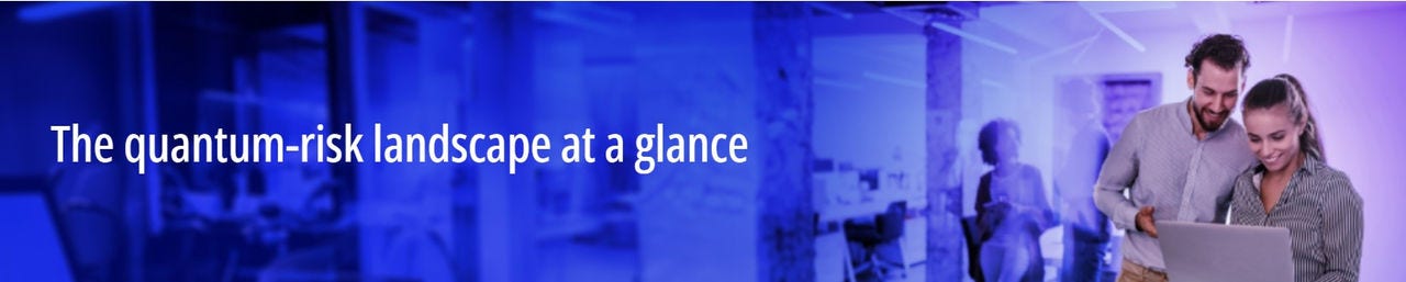 Colleagues looking at computer