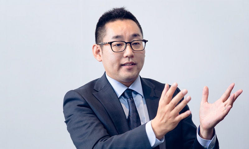 Japanese alt text: KPMG　三宅