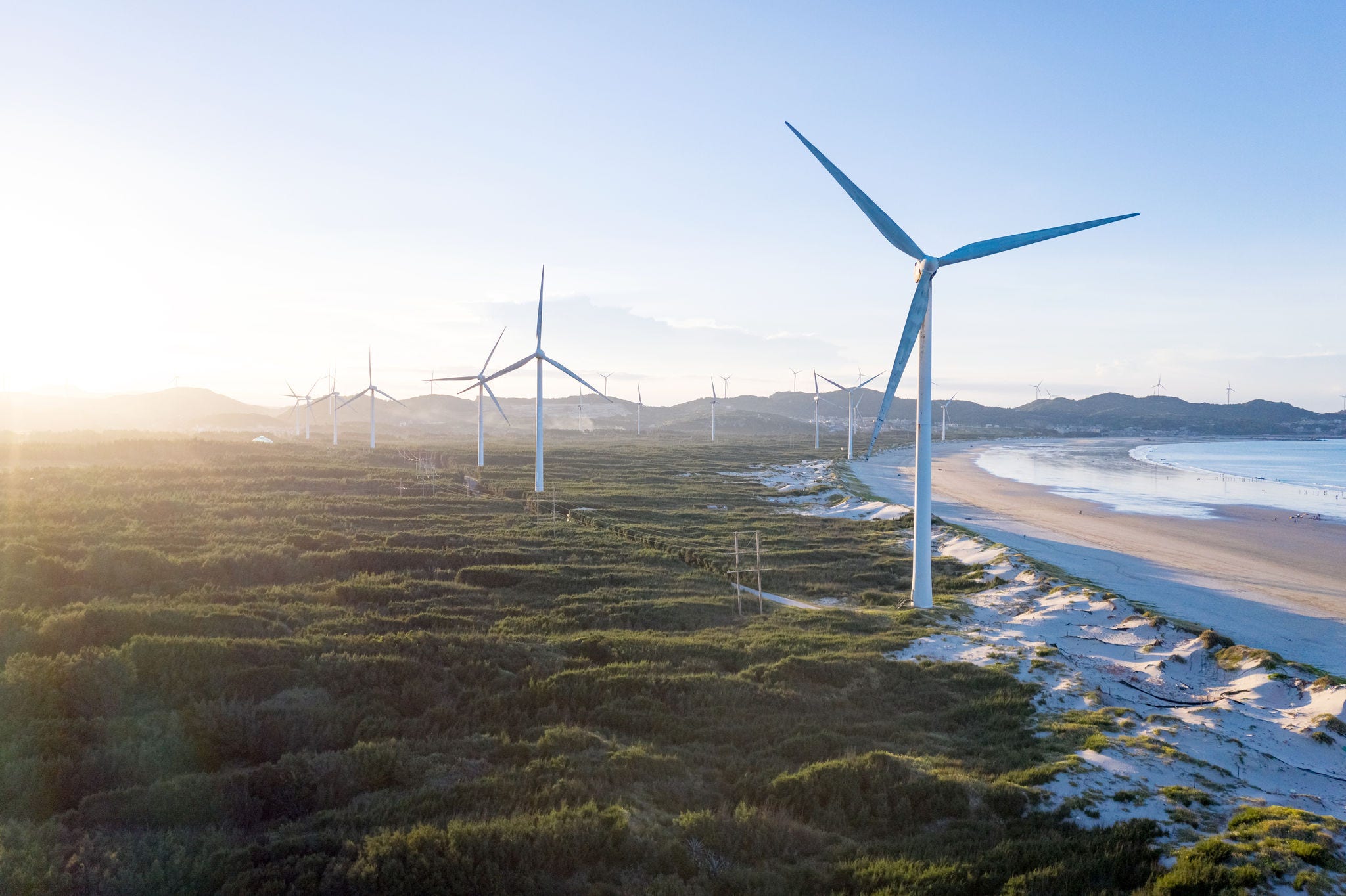 1328819052 Wind power station by the sea