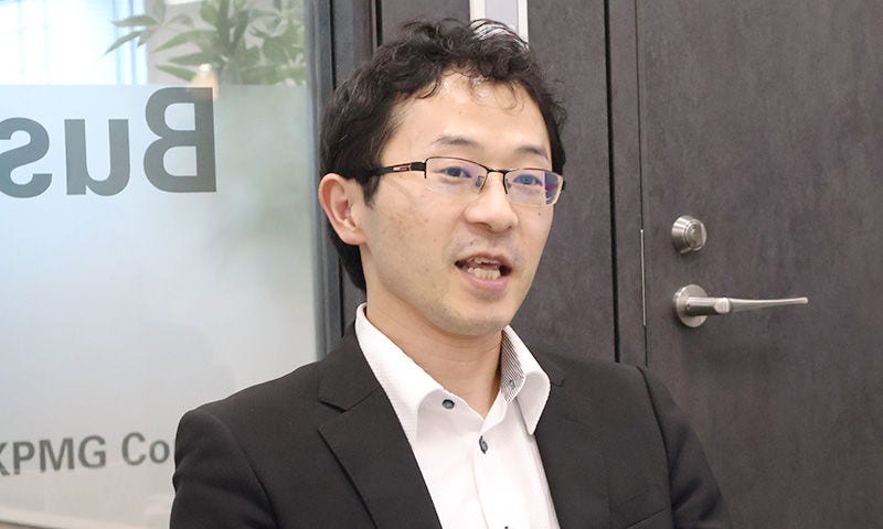 Japanese alt text: KPMG　旭