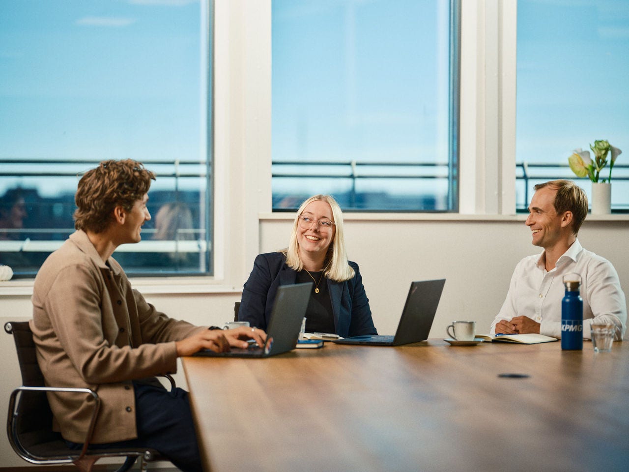 Two employees are talking