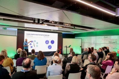 People sat on chairs at a presentation in the Ignition centre