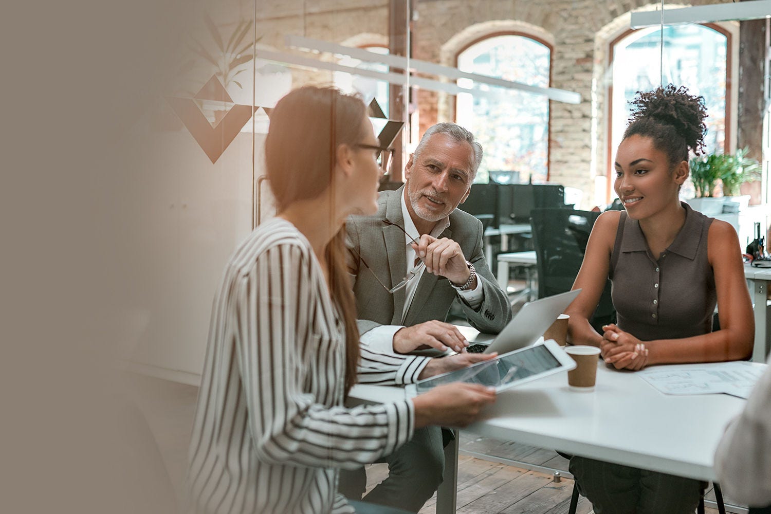 Colleagues chatting in the office
