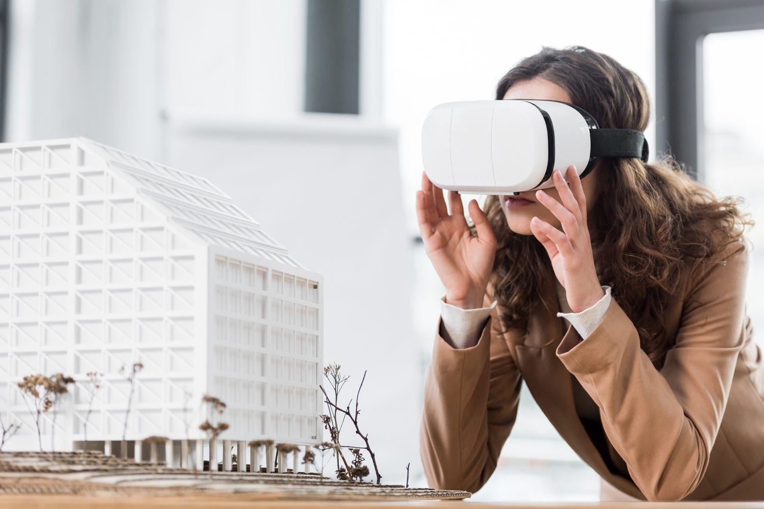 Person wearing a virtual reality set woman with glasses in digital space banner