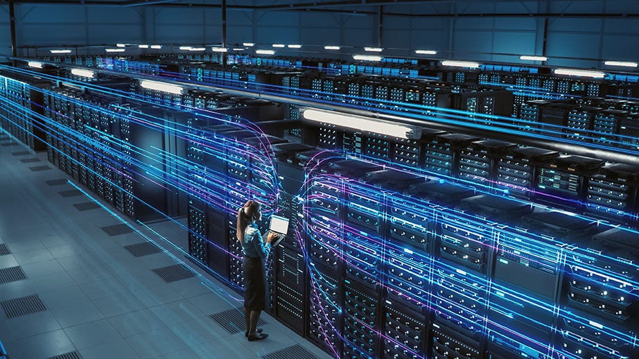 3D Graphics Concept: Big Data Center Female Chief Technology Officer Using Laptop Standing In Warehouse, Activates Servers, Information Digitalization Starts. SAAS, Cloud Computing, Web Service
