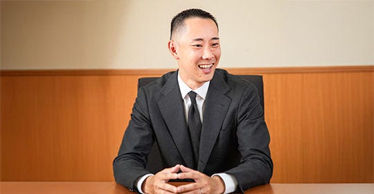 Japanese alt text: KPMG　村山