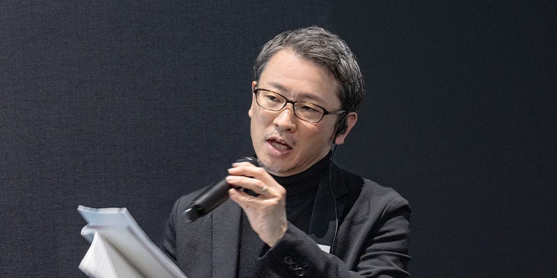 Japanese alt text: 日本経済新聞社　小泉氏