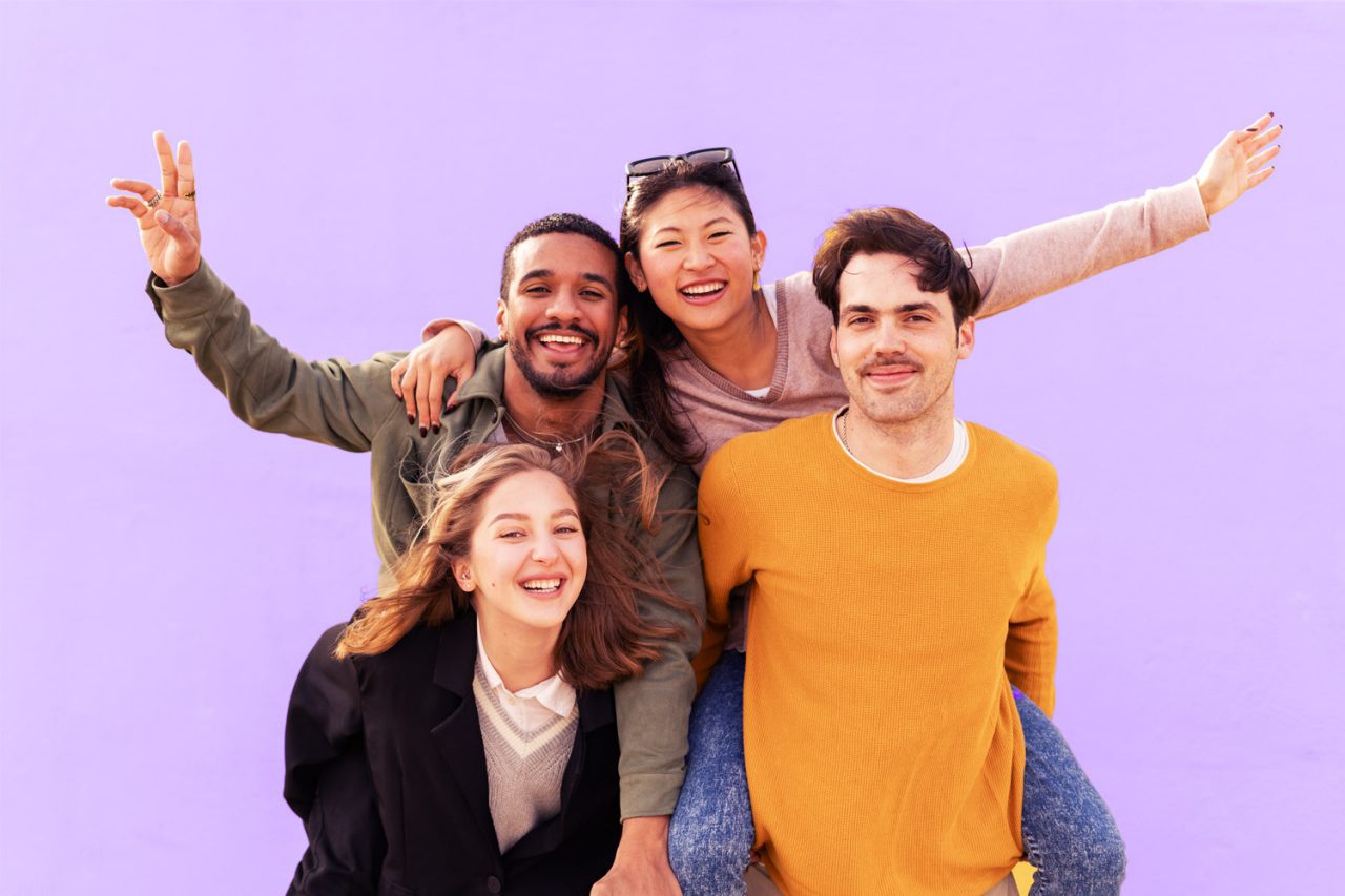 Grads careers pathways Engineering, Technology and Digital Four people having fun on purple background