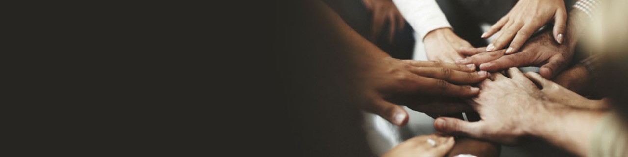 People with hands as a team
